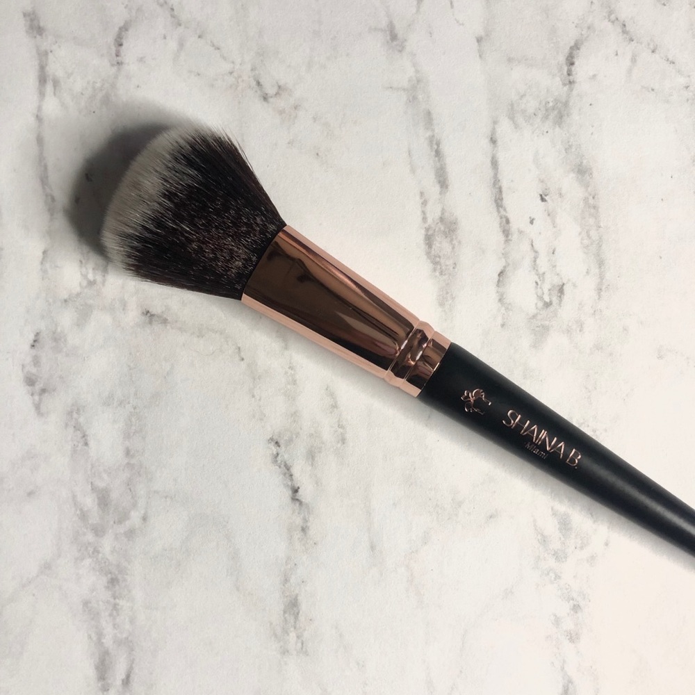 Shaina B. Brush